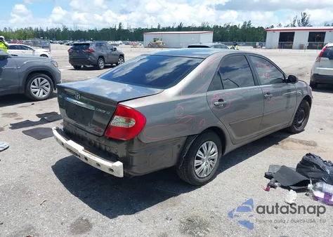 2003 Toyota Camry Le z USA, uszkodzony, nr VIN 4T1BE32KX3U737323